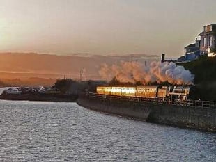 'Concorde' locomotive steams alongside the River Teign
