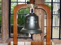 ONE FOOT IN THE PAST: Town’s adopted frigate