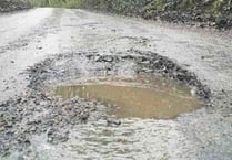 Road’s ‘bomb craters’ damaging cars daily