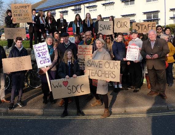 Head exits troubled college