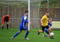 FOOTBALL: Just one weather casualty on soggy Saturday