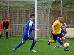 FOOTBALL: Just one weather casualty on soggy Saturday