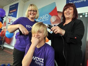Young Owen loses his locks for charity