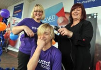 Young Owen loses his locks for charity