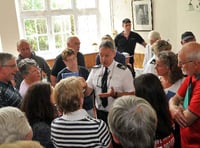 Emotions run high at fire cuts meeting