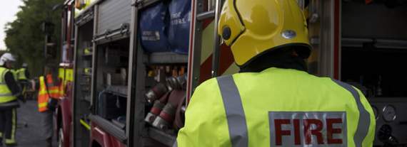 Fire crews battle a blaze at scrapyard