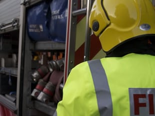 Firefighters battle blaze in asbestos roof