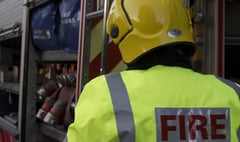 Firefighters battle blaze in asbestos roof