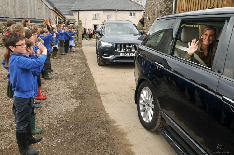 Photo: Steve Pope MDA030522A_SP002
TRH The Earl and Countess of Wessex visit East Shallowford Farm on Dartmoor to open the Farm Development Project 2022. Youngsters from Widecombe Primary School wave goodbye to the Countess