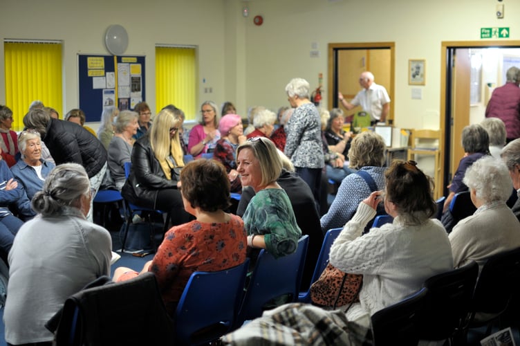 Attendees at Rowcroft Bovey Tracey’s fashion show waiting for the show to begin 