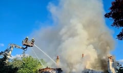 Teignbridge firefighters battling thatched property blaze