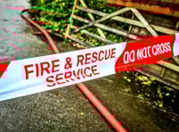 Firefighters battle blaze in combine harvester