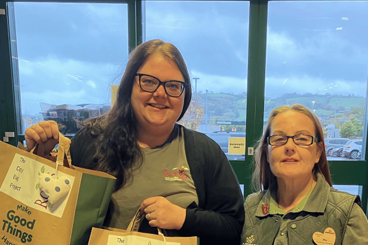 Rosie Dawson and Morrisons community champion Mo with some of the bags.