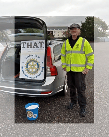 Rick Birmingham a volunteer from Dartmoor Vale Rotary Club with the collection bucket at the Racecourse car park directing the public during a vaccination session.