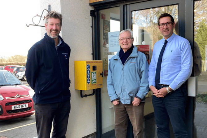 Devon Air Ambulance presents a new defibrillator in Bovey Tracey. Pictures, from the left, Toby Russell, Devon Air Ambulance Projects Manager, Cllr Tony Allen, Bovey Tracey Town Council, and Mark Wells, Town Clerk, Bovey Tracey Town Council.