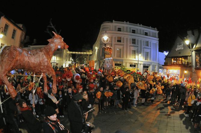 More than 200 schoolchildren took part in the Newton Abbot Lantern Parade during one of the town’s late night shopping events.
