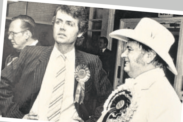 Teignbridge MP Patrick Nicholls and Alan “Howling Laud” Hope of the Official Monster Raving Loony Party at the count of the 1987 General Election in Teignbridge