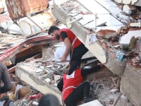 As Rotarians raise £2K for quake victims they urge people to donate