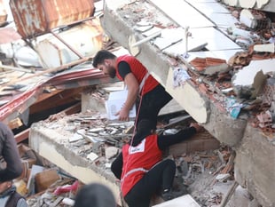 As Rotarians raise £2K for quake victims they urge people to donate