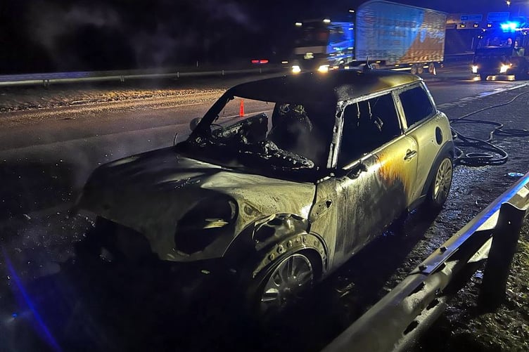 Crews from Middlemoor Fire Station and Danes Castle Fire Station - Exeter were mobilised to a car fire on the M5 yesterday evening. On arrival crews donned breathing apparatus and used a hose reel to extinguish the fire. 
Picture: Danes Castle Fire Station (March 2 2023)