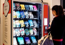 Penguin installs book vending machine at St David's Station in Exeter
