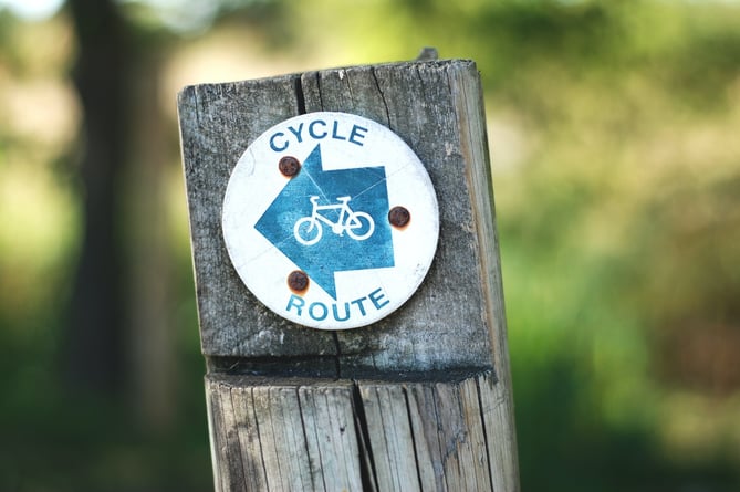 Cycle sign. (Image: Gemma Evans / Unsplash)