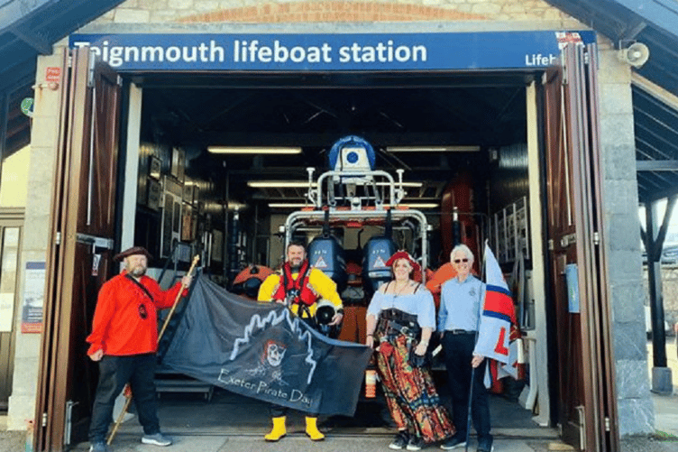 Teignmouth RNLI’s Volunteer Crew, Dave and Volunteer Visits Officer, Brian, with the Exeter Pirates.