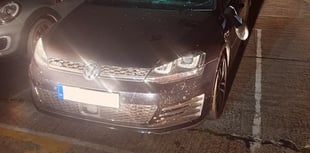 Man arrested after car windscreen smashed in Newton Abbot car park