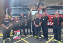 Firefighters pay visit to Newton Abbot as part of 160 mile walk