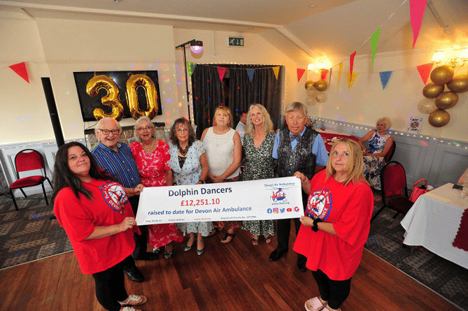 Dolphin Dancers celebrate 30 years with cheque presentation