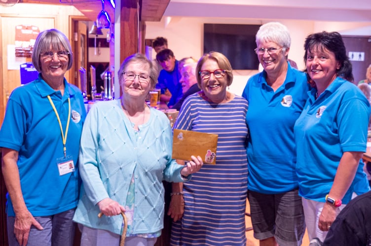 Grace Nichols presenting cheque to Dawlish Disability Transport