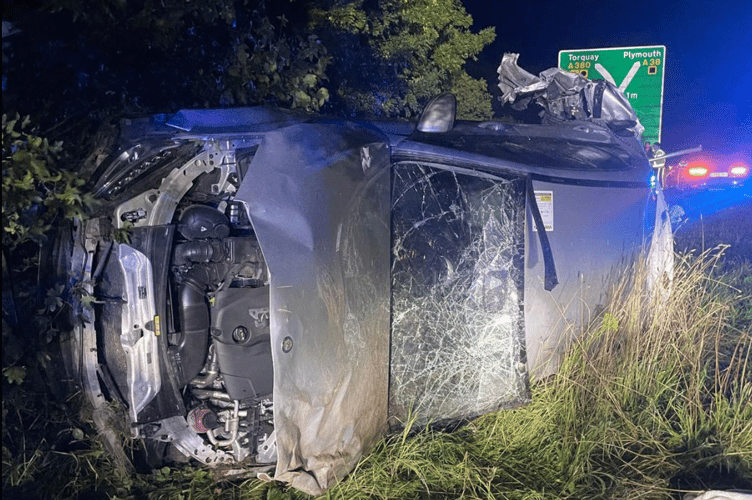 Flipped car on A38