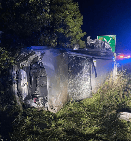 Flipped car on A38