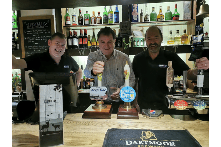 MP Mel Stride (centre) together with pub owners James Houghton and Gary Roberts