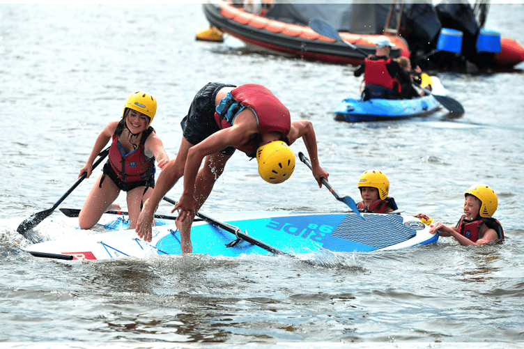 Competitors in the junior raft race event at Teignmouth Regatta