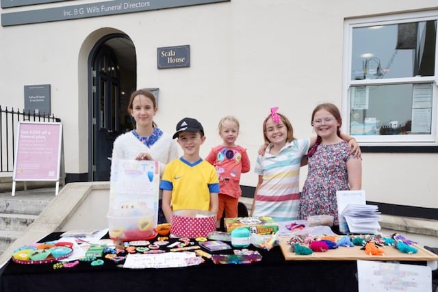 Kitty `Dawson and Bethany Lemon-Davies, both 10, with their fund-raising stall. Photo by Bob Simpson