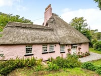 "Quintessential chocolate box" cottage for sale has estuary views 