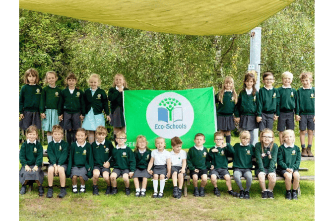 TV legend Sir David Attenborough has praised pupils at Dunsford Community Academy after they achieved the prestigious Eco-Schools Green Flag award