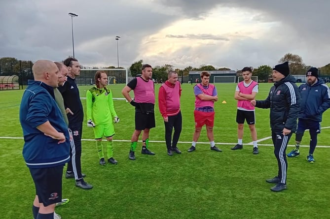 Exeter City Assistant Manager Kevin Nicholson puts para sports groups through their paces at the club's Cliff Hill Training Ground.
