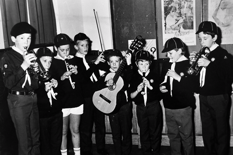 Pictured above are the group after having received commemorative badges, while below a musical line up comprising Jonathan Laird, Adam Robins, James Henderson, Christhoper Collings, Ian Humphrey, Michael Heath and Ian Langly prepare for a musical interlude at the event