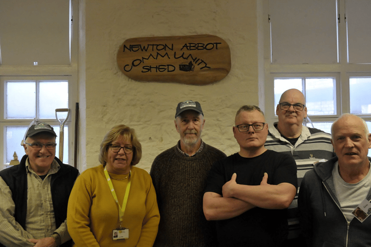 From left: Shed member Pete Stevens, Newton Abbot Library Manager Lynn West, Shed members Albert
Turner, Ollie Doughty, Tim Faulkner and Kevin Beard.