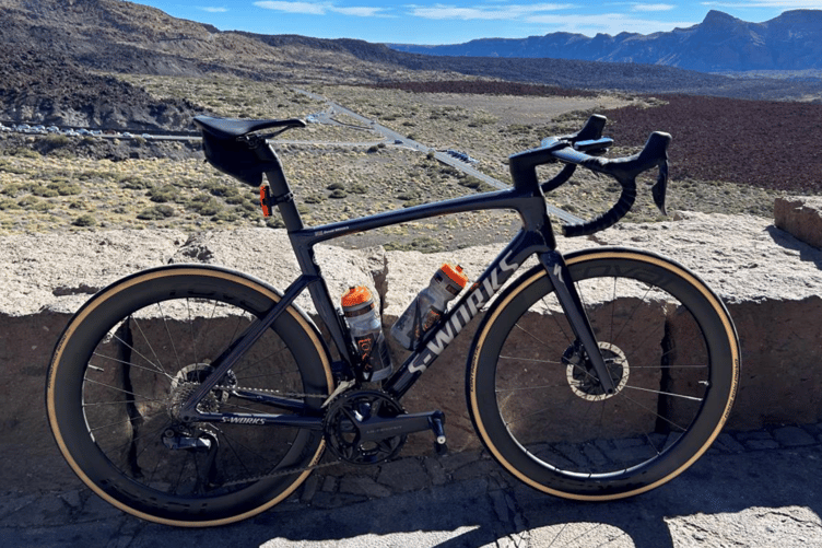 The first bike is a Specialized Tarmac SL7 S-Works in dusty blue with silver decals with frame serial number WSBC004421040S