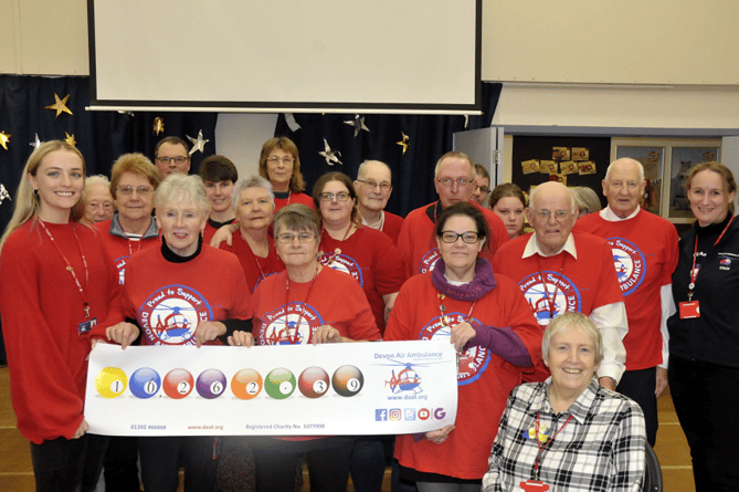 Devon Air Ambulance volunteers with the cheque for £16,262.39