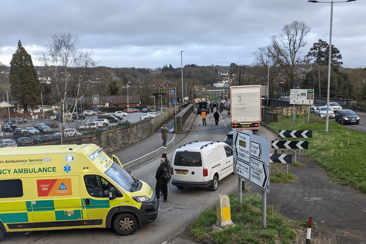 Driver in custody following crash near Aldi