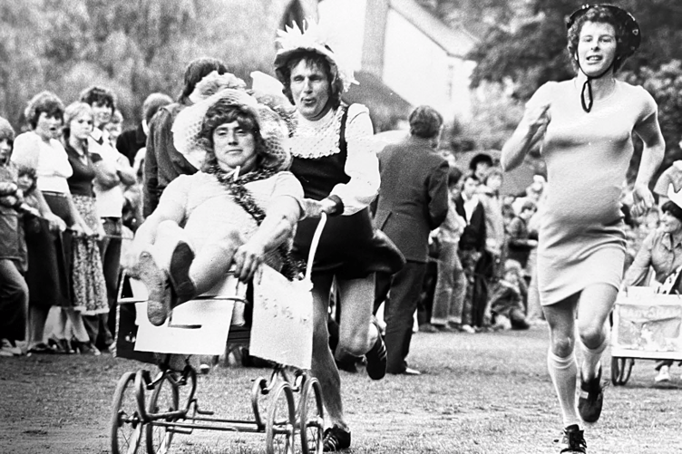 Almost a Le Mans style start for the Pram Race as it leaves The Lawn.