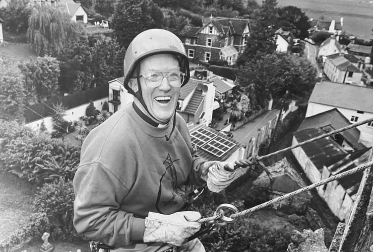 October 1995. Abseiling vicar Bob Southwood on top of the world at Combeinteignhead Church