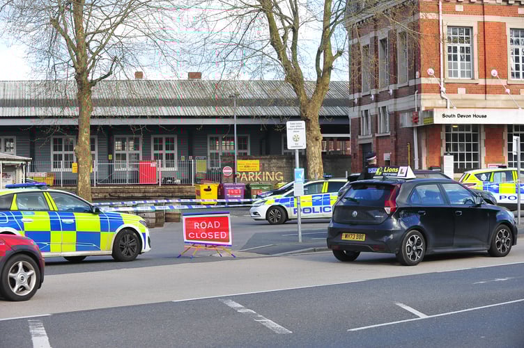 Police at the scene of an incident in the car park of Newton Abbot Railway Station