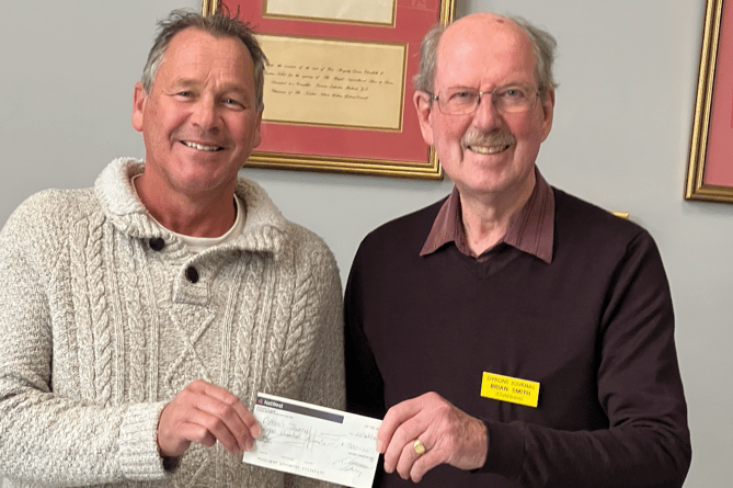 A cheque for £300 was presented to Dyrons Journal by Devon Lodge 1138