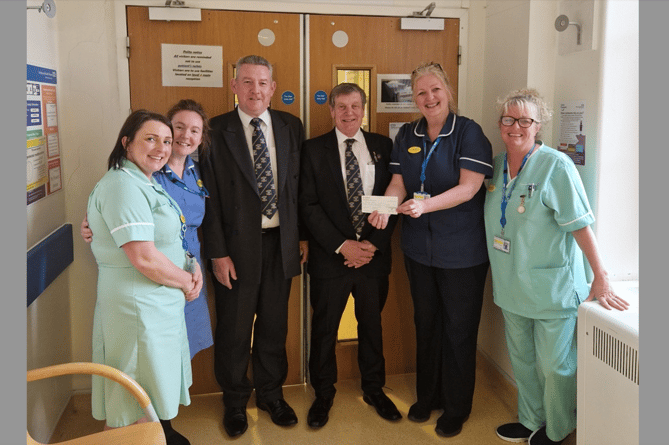 From left to right: Healthcare assistant, Donna Hamlet, nurse Annabelle Gardner, Master of Newton Lodge, Ian Adams, newton Lodge's charity steward, Tony Vile, Turner Ward manager, Sara McMurray, and healthcare assistant Nicky Conway.