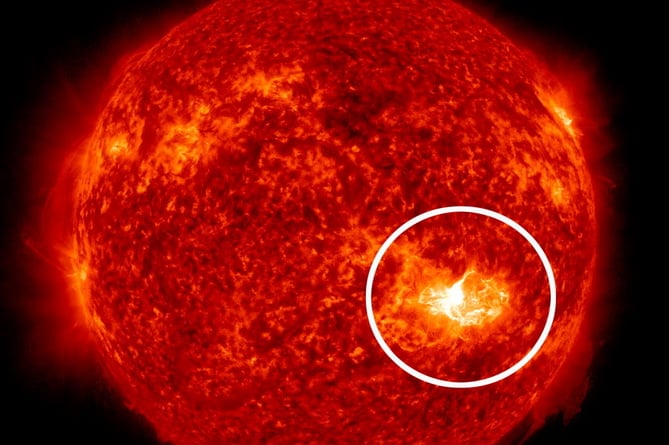 Image captured by NASA's Solar Dynamics Observatory (SDO) spacecraft shows the solar flare from the Sun's sunspot at bottom right of star on Thursday (9 May). SDO observes in different wavelengths to uncover different activity details. A gigantic sunspot 15 times wider than Earth could cause chaos this week. The U.S. government has released a warning to brace for severe solar storms that may knock out communications, the electric power grid, and navigation. The sunspot AR3664, stretching 124,000 miles-wide according to Spaceweather.com, has released intense bursts of energy and radiation in the direction of our planet in the form of X-class solar flares, which are the most powerful. America's official Space Weather Prediction Center (SWPC) say they are monitoring the sun following the series of flares and coronal mass ejections (CMEs) that began on Wednesday. They report: "Space weather forecasters have issued a Severe (G4) Geomagnetic Storm Watch for the evening of Friday, May 10. Additional solar eruptions could cause geomagnetic storm conditions to persist through the weekend."